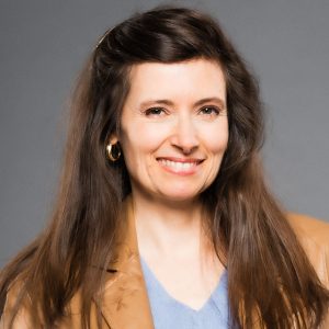 A headshot for writer and editor Robin F Pool 